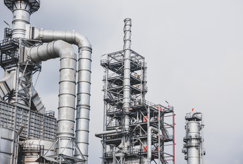 Industrial zone,The equipment of oil refining,Close-up of industrial pipelines of an oil-refinery plant,Detail of oil pipeline with valves in large oil refinery