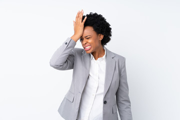 African american business woman over isolated white background having doubts with confuse face expression