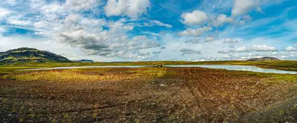 Panoramic view over rough and colorful landsacpe in Iceland, summer