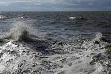 waves crashing on rocks