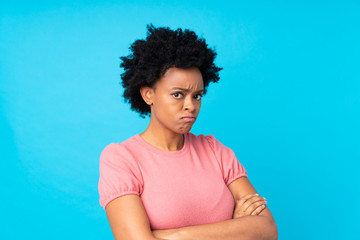 African american woman over isolated blue background thinking an idea