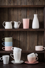 kitchen dishware on old dark wooden background