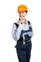 The head of the female construction team smiles and gestures silence to everyone. Isolated