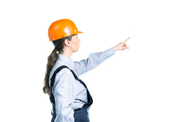 Female engineer builder from the side shows into the distance. Isolated