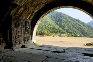 Armenia: Haghpat Monastery, Haghpatavank - arch with crossstones and view on Caucasus