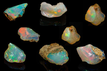 macro mineral stone rare and beautiful opals on a black background