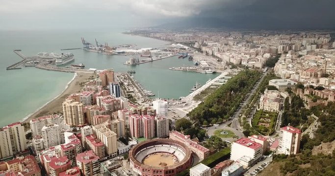 Malaga with Placa de Torros from castle in sunny time. Andalusia, Spain 