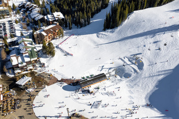 Aerial view winter recreation and sports in Copper Mountain in Colorado with snow fall