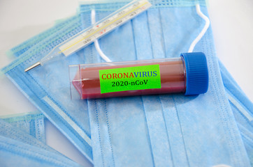 medical masks, pills and thermometer