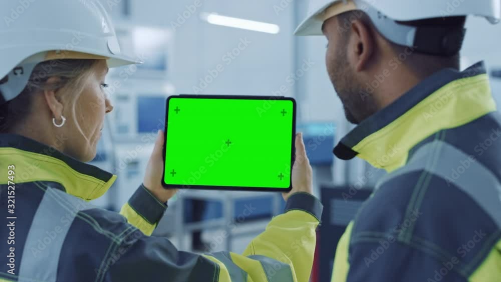 Aufkleber industry 4.0 factory: chief engineer and project supervisor in safety vests and hard hats, talk, use