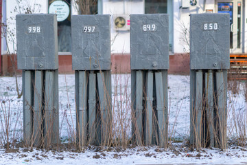 old gray metal junction boxes with numbers