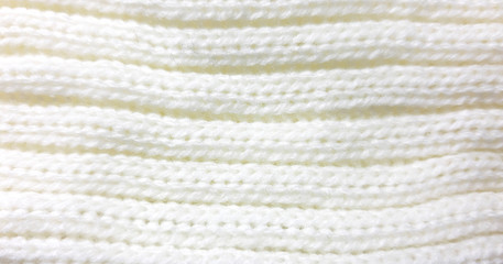 Light coloured knitted delicate texture, background. Fashion pattern modern, photo backdrop surface empty