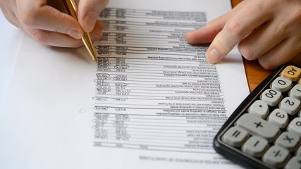 Businessman working at office and calculating finance