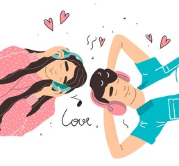 Lovers boy and girl listen to music on headphones