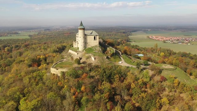 Scenic aerial view of impressive medieval Kuneticka Hora Castle on sunny autumn day, Pardubice Region, Czech Republic