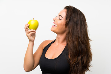 Beautiful young girl with an apple