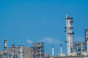 Industrial zone,The equipment of oil refining,Close-up of industrial pipelines of an oil-refinery...