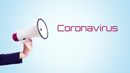 Panic for coronavirus. Person holding a megaphone