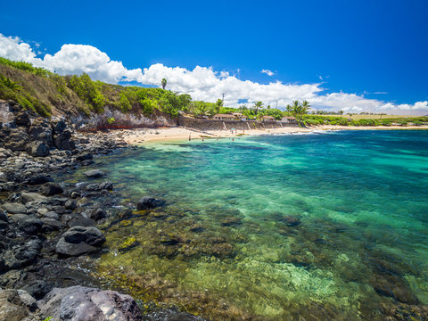 Ho'okipa Beach Park in Maui Hawaii, renowned windsurfing and surf site for wind, big waves and big Turtles drying on sand. Snorkeling paradise for coral reefs.