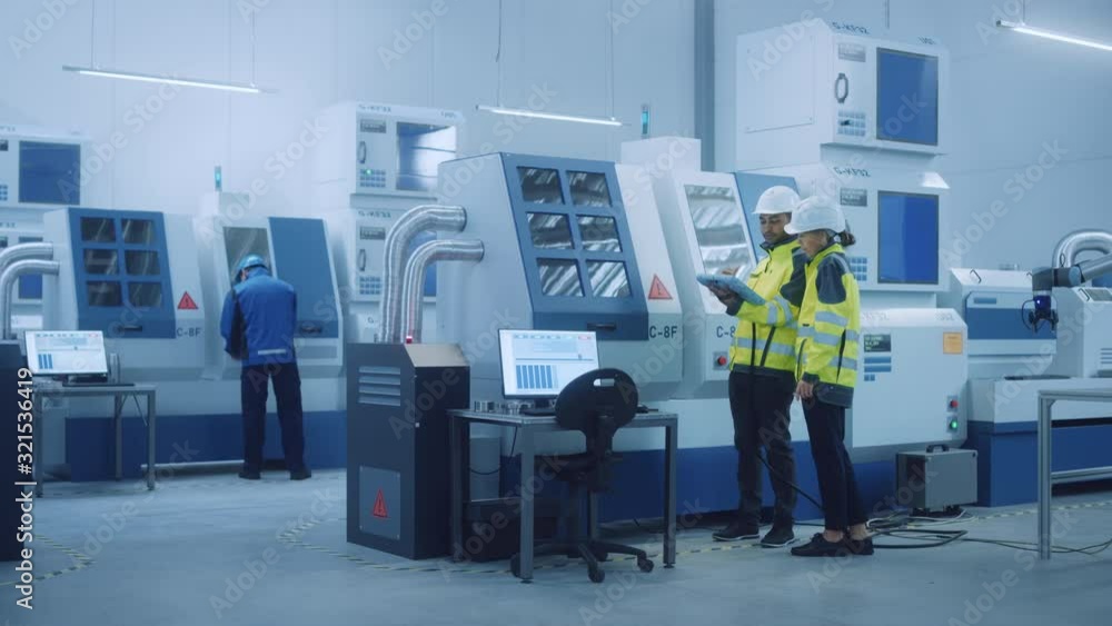 Poster Chief Engineer and Project Manager Wearing Safety Vests and Hard Hats, Use Digital Tablet Controller in Factory, Optimizing CNC Machinery,Programming Machine for Increasing Production Line Efficiency 