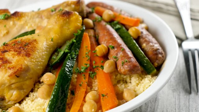 couscous- semolina with vegetable, chicken leg and sausage