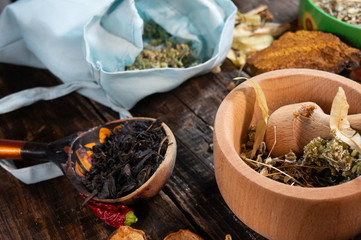 table of herbalist and healer healing herbs, alternative medicine, healer set