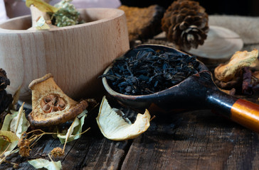 table of herbalist and healer healing herbs, alternative medicine, healer set