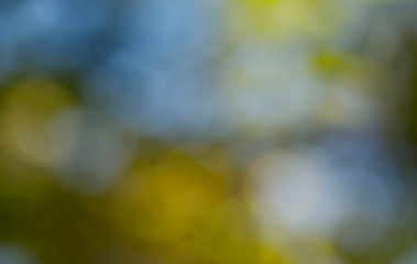 Bokeh Background. Blurry abstract yellow and blue colors. Colorful abstract background. Background texture. Abstract blue with yellow background. Blur image of yellow light. Blurry lights.