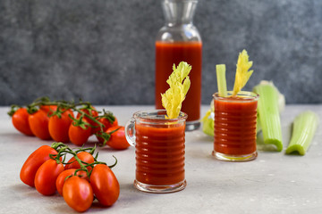 Vegetable juice healthy food. Healthy soft drink with tomatoes and celery. vitamin smoothies tomato juice, selective focus image