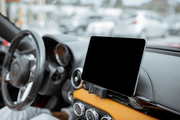 Car dashboard with a digital touchscreen with empty space to copy paste, close-up view. Smart car...