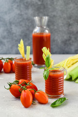 Vegetable juice healthy food. Healthy soft drink with tomatoes and celery. vitamin smoothies tomato juice, selective focus image