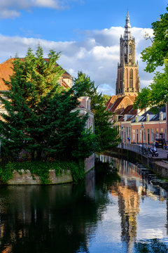Netherlands, Utrecht, Amersfoort, Tower of Our Lady reflecting in Eem river canal