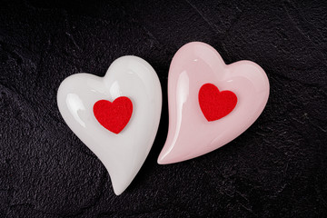 Obraz premium Double Hearts. Two hearts on black