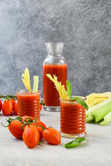 Vegetable juice healthy food. Healthy soft drink with tomatoes and celery. vitamin smoothies tomato juice, selective focus image