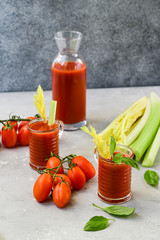 Vegetable juice healthy food. Healthy soft drink with tomatoes and celery. vitamin smoothies tomato juice, selective focus image