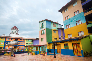 Fototapeta premium Guatape, Antioquia / Colombia - February 02, 2020. It is one of the most colorful towns in Colombia, it reflects it in the form of baseboards and streets full of life.