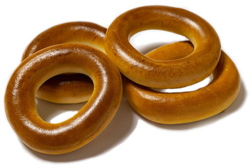 Wheat flour bagels on a white background
