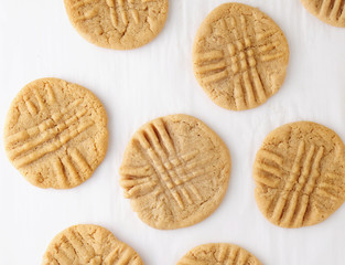 Peanut butter cookies top view on white background.