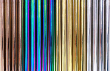 Multi-colored chrome pipes. Background from colored metal pipes.