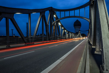 bridge and water tower in Darmstadt at night.