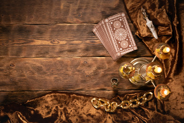 Tarot cards on fortune teller old desk background. Future reading.