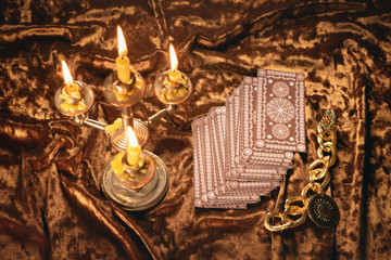 Tarot cards on fortune teller old desk background. Future reading.