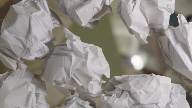 Trash, bottom view. Papers filled with useless ideas. Wastebasket concept.