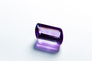 macro close up in cut amethyst purple gem