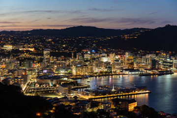 Fototapeta na wymiar Sunset/blue hour view of Wellington, New Zealand at night from Mount Victoria. Famous scenic location for tourists.