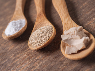 yeast on wood background