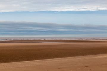 Low tide at Formby Beach in Merseyside, on a sunny winters day