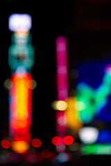 Abstract Bokeh city lights at night from Times Square in New York City.
