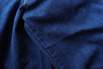 Jeans background. Denim jeans texture. Blue denim pattern.