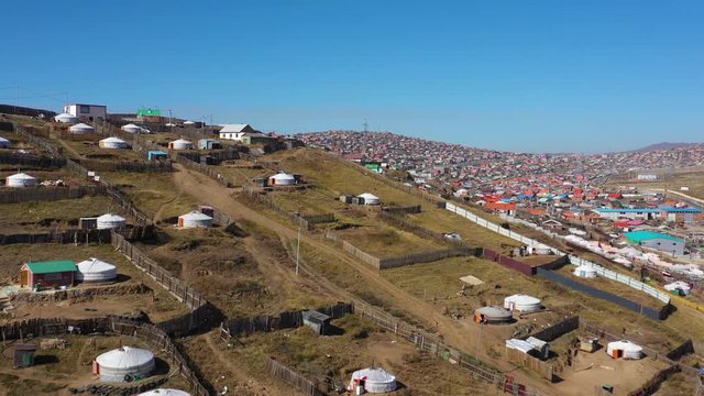Aerial Mongolia Ulaanbaatar Impoverished Villages September 2019 Sunny Day 4K Mavic Pro  Aerial video of rundown impoverished villages on a hill in Ulaanbaatar Mongolia on a sunny day.